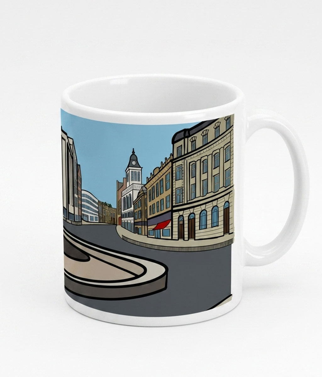 Mug with a cityscape design on a white background