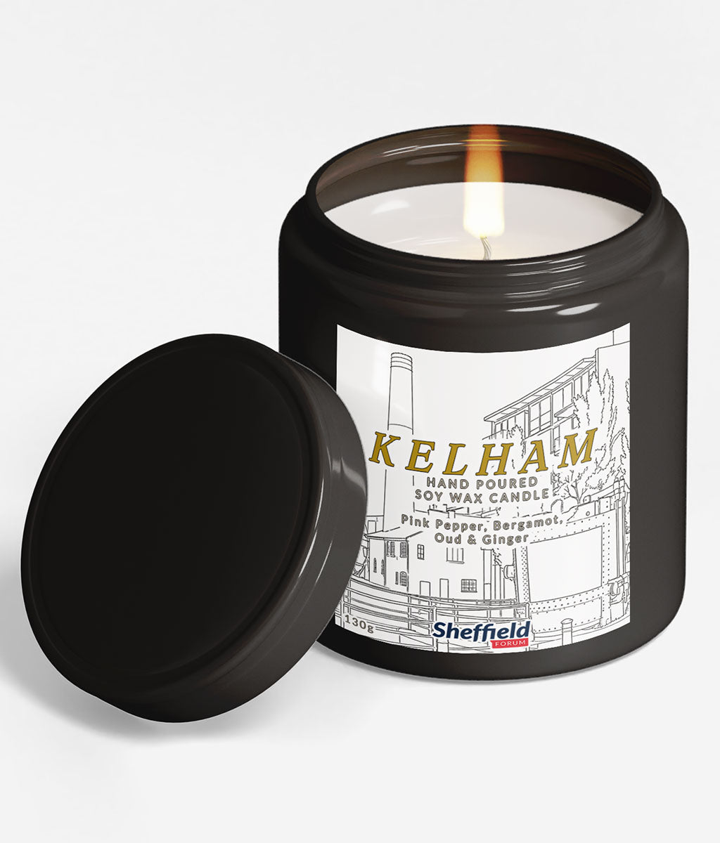 Candle in a black container with a label featuring 'Kelham' and 'Sheffield'.