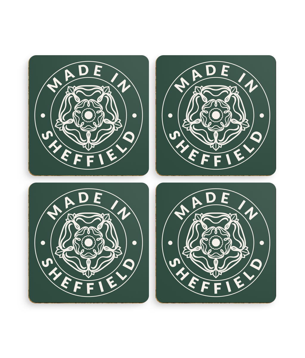 Four green coasters with 'Made in Sheffield' design on a white background