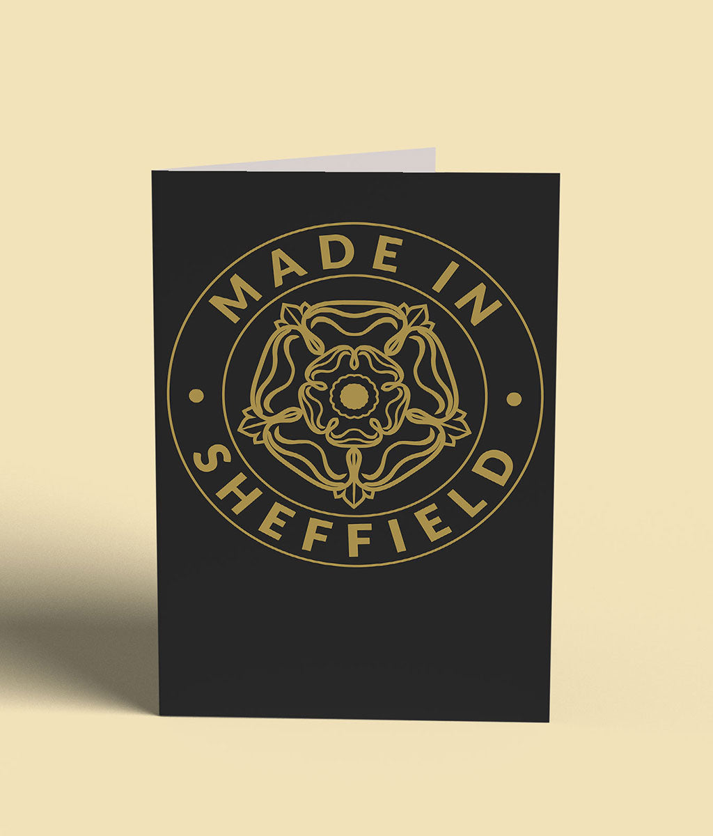 Black card with gold 'Made in Sheffield' text and emblem on a beige background