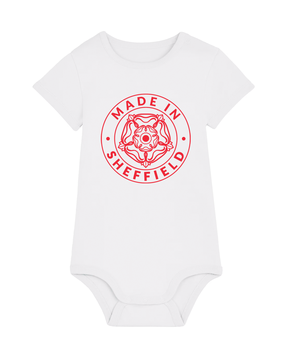 White baby onesie with red 'Made in Sheffield' print on a white background
