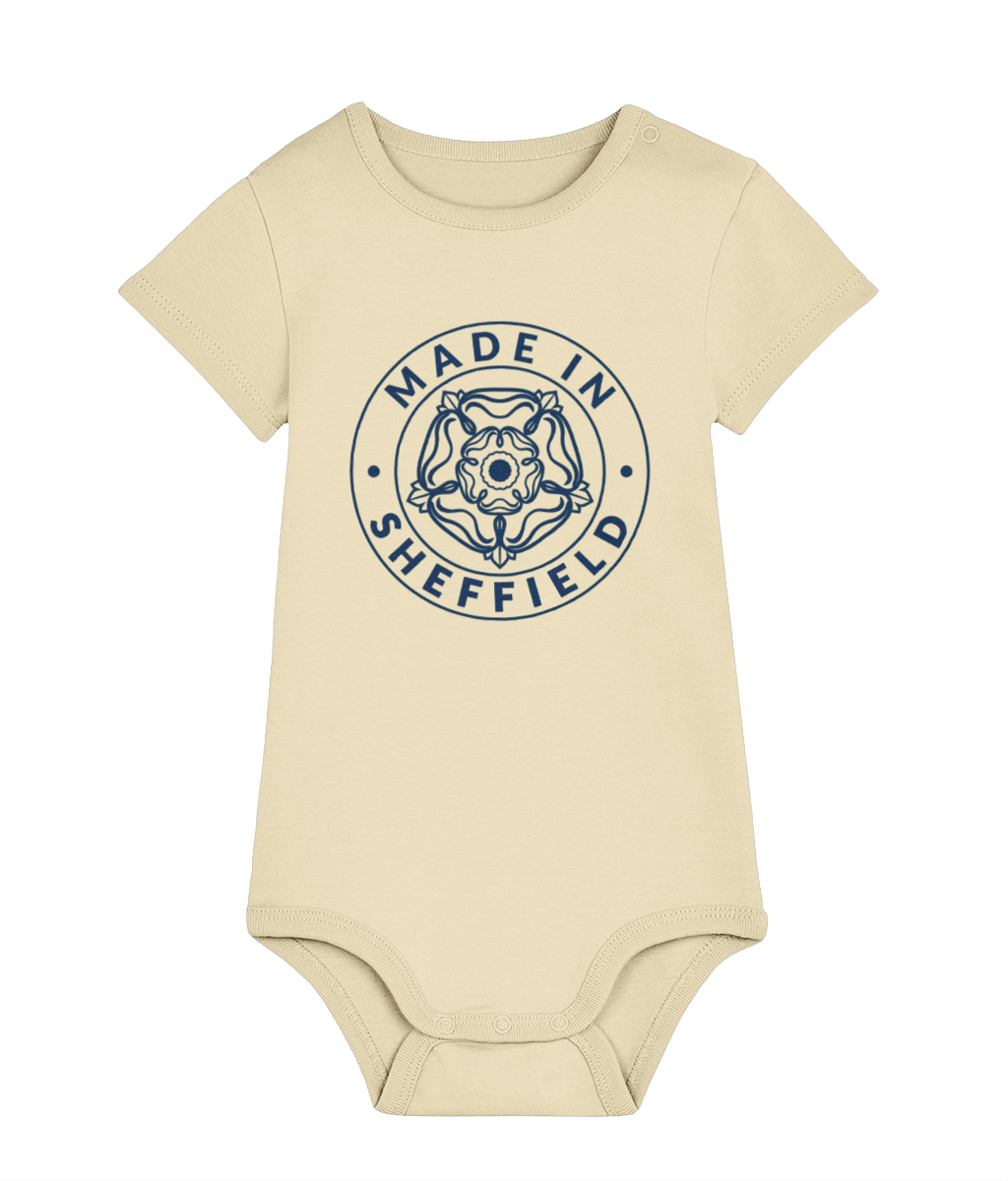 Beige baby onesie with 'Made in Sheffield' print on a white background