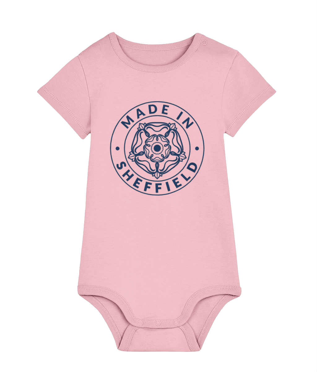 Pink baby onesie with 'Made in Sheffield' text on a white background