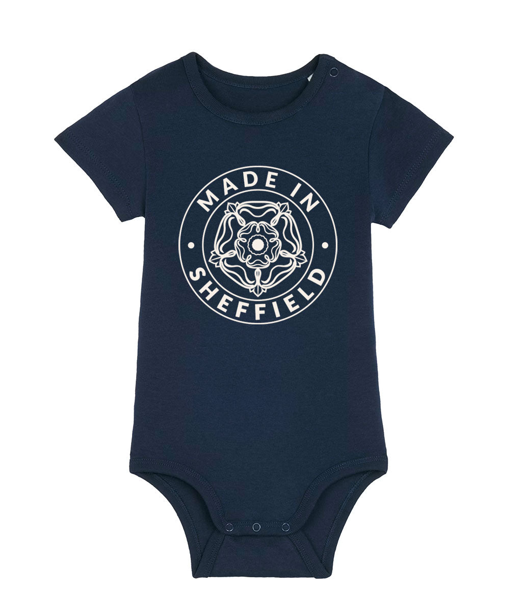 Navy blue baby onesie with 'Made in Sheffield' print on a white background