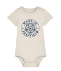 Beige baby onesie with 'Made in Sheffield' print on a white background