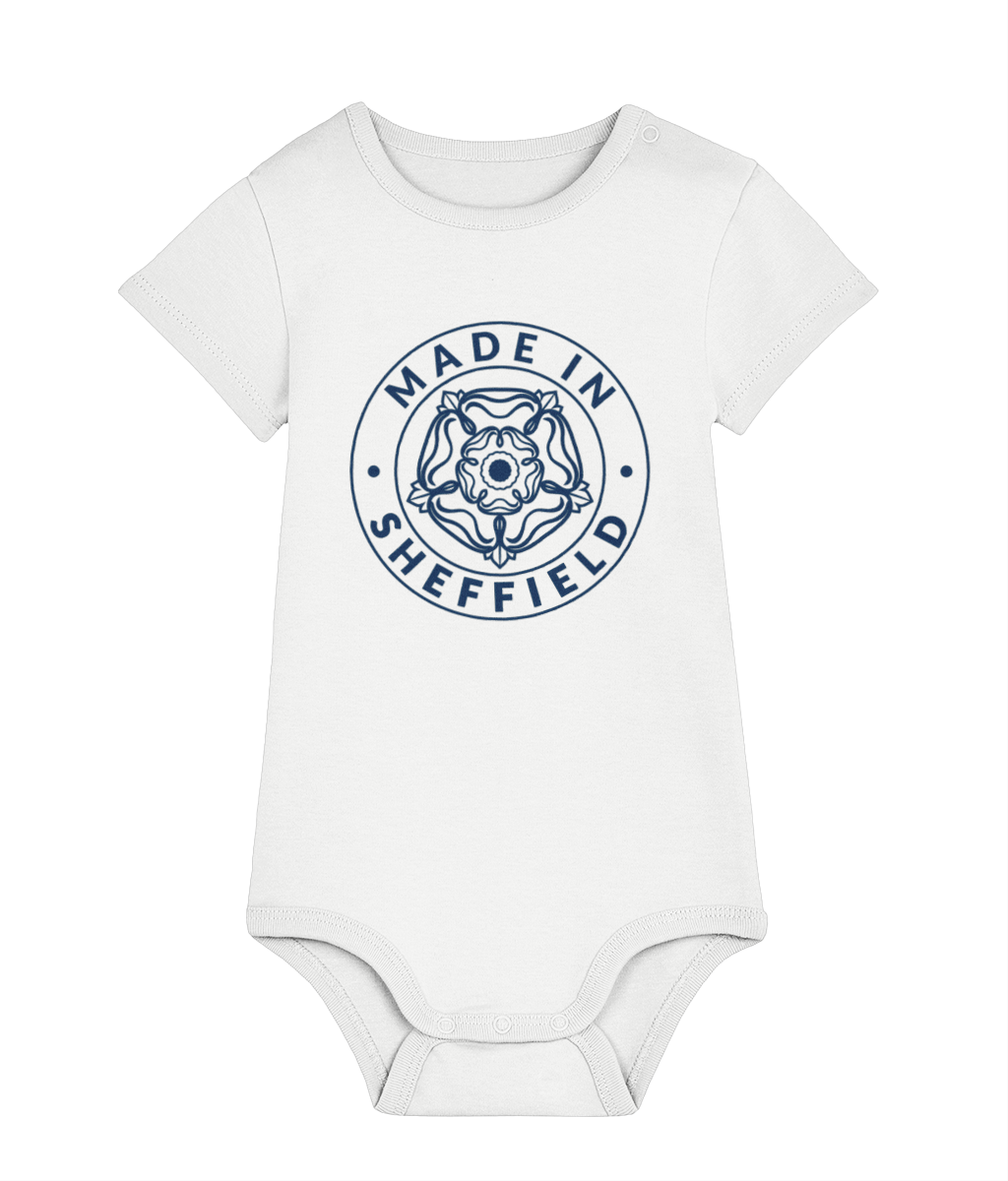 White baby onesie with 'Made in Sheffield' print on a white background