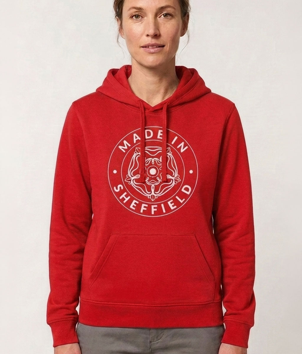 Person wearing a red hoodie with 'Made in Sheffield' logo on a white background
