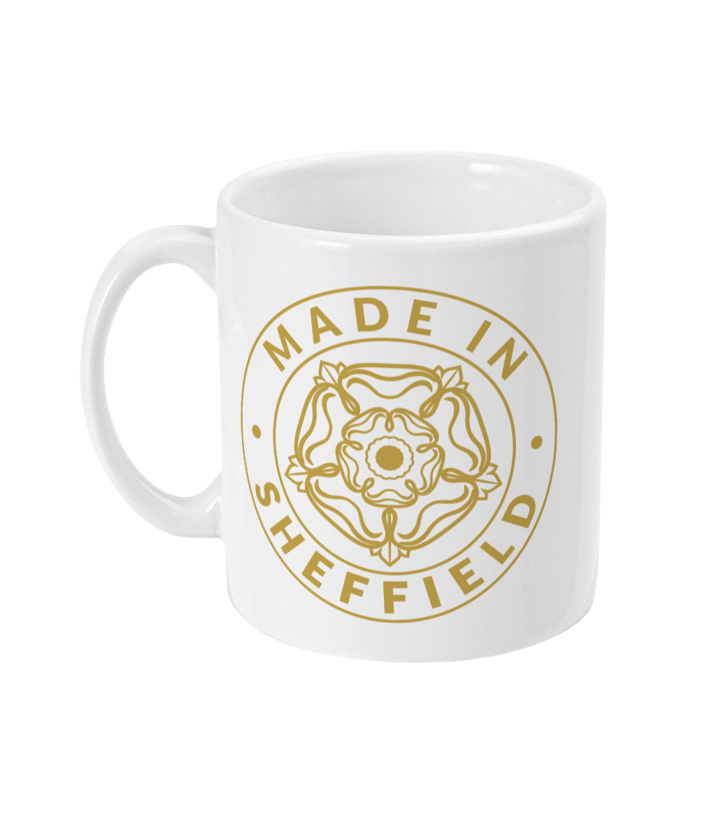 White mug with gold 'Made in Sheffield' design on a white background