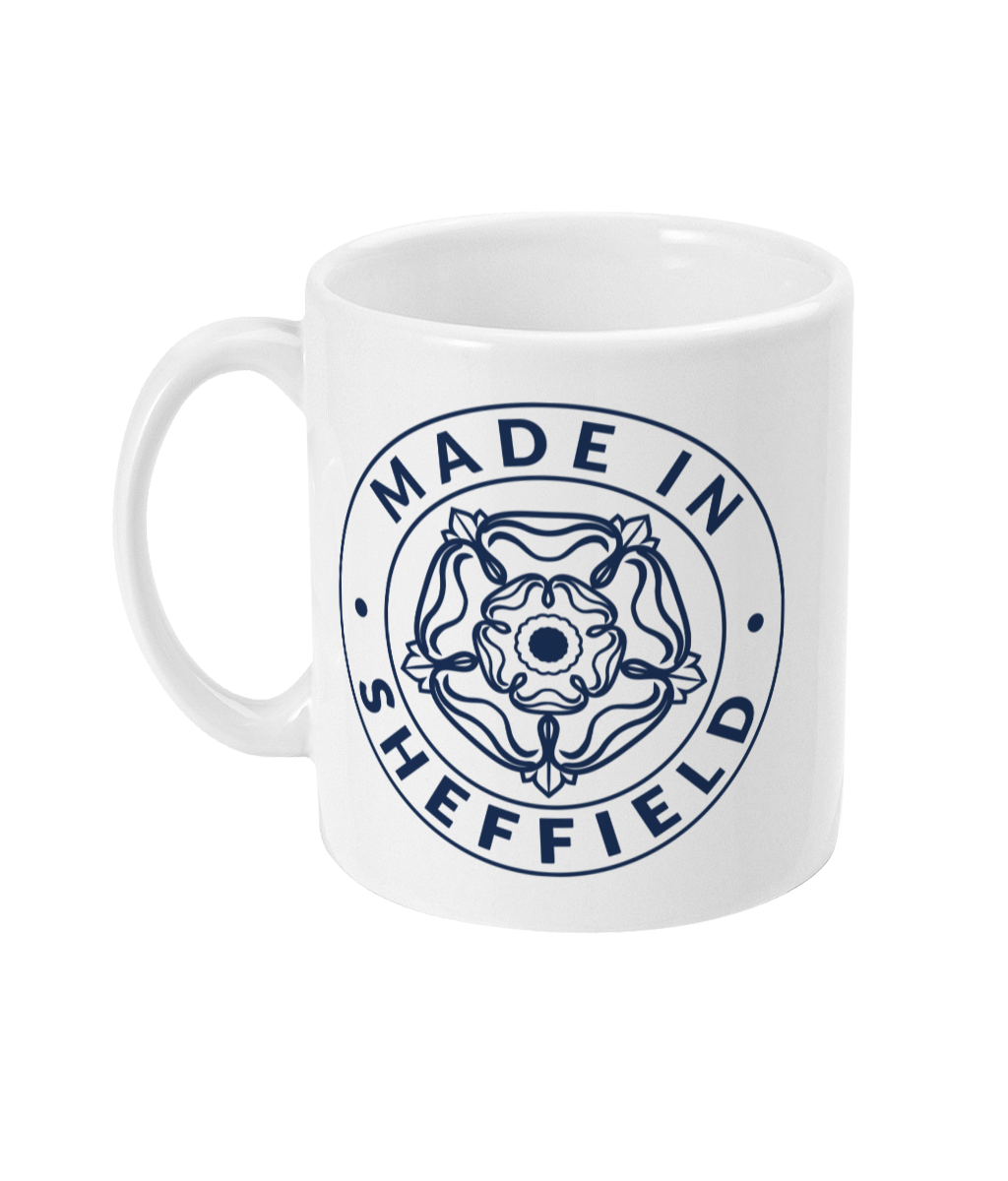White mug with navy blue 'Made in Sheffield' design on a white background
