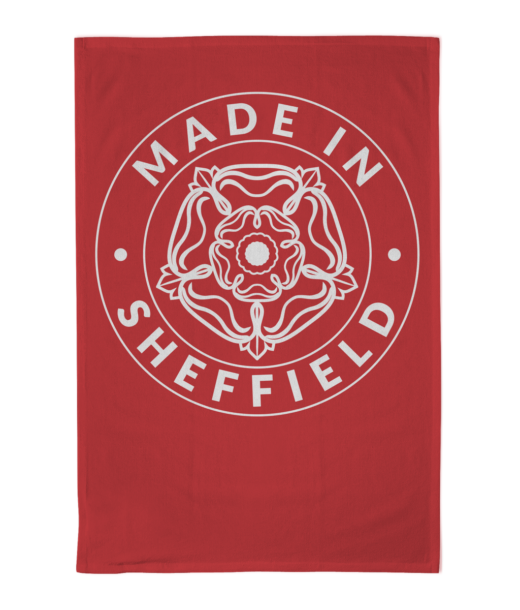 Red towel with 'Made in Sheffield' text and emblem on a white background