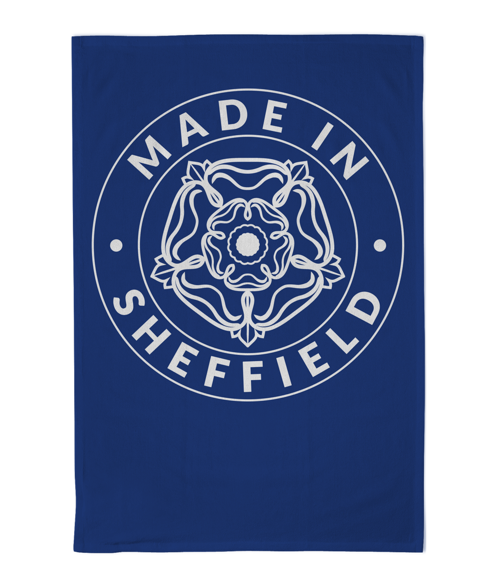Royal Blue towel with 'Made in Sheffield' text and emblem on a white background