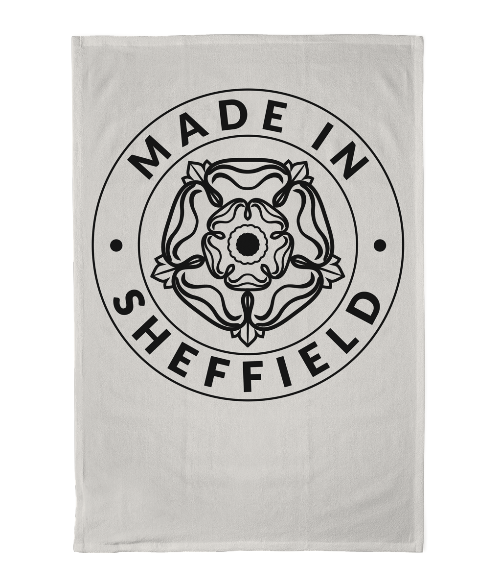 Stone-colour towel with 'Made in Sheffield' logo on a white background