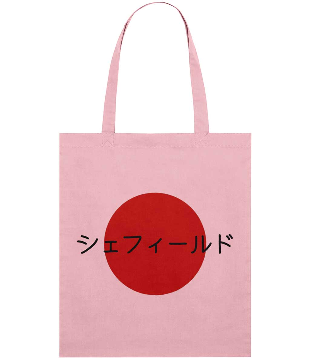 Pink tote bag with a red circle and Japanese text on a white background