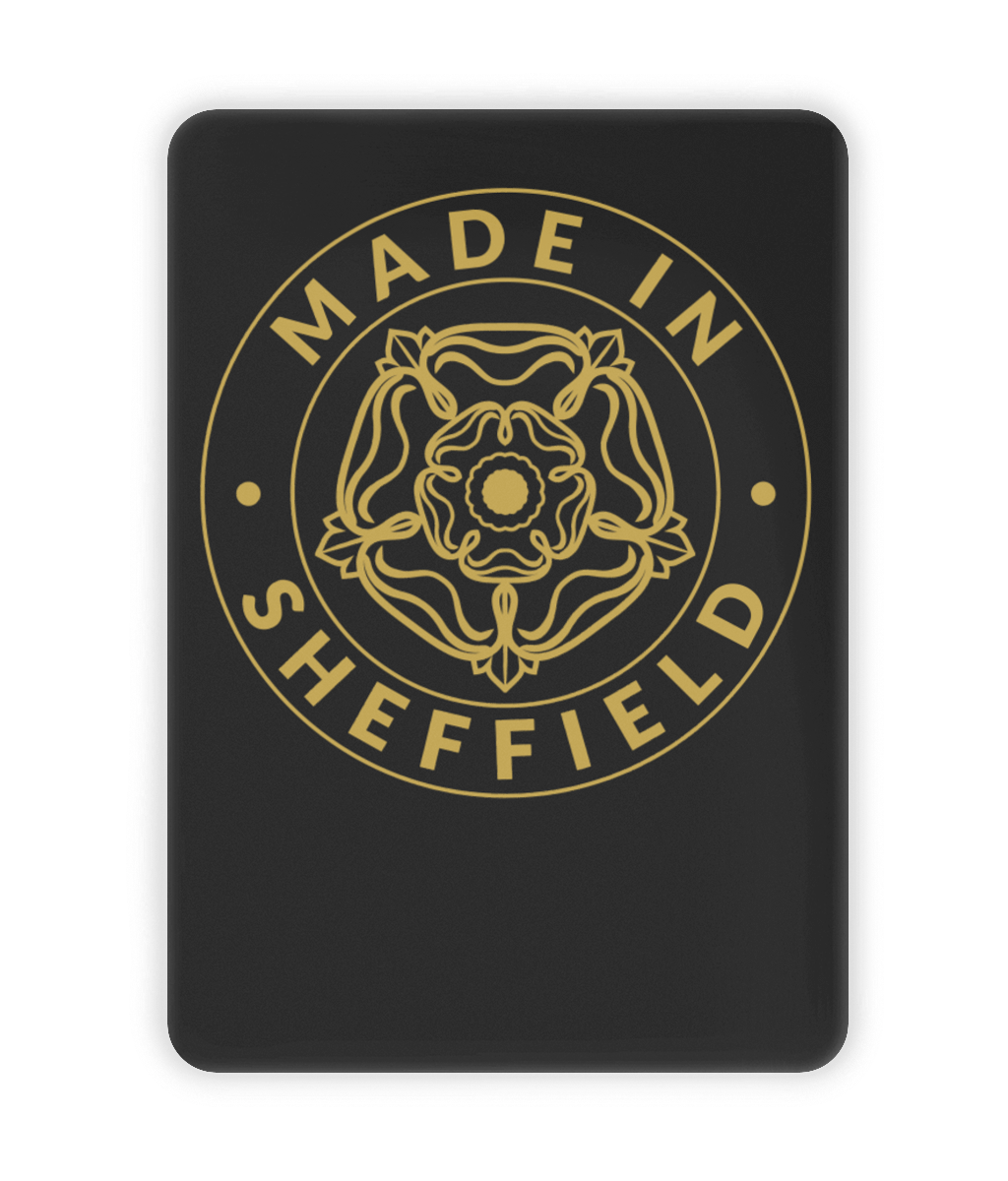 Black ceramic fridge magnet with gold 'Made in Sheffield' design on a white background