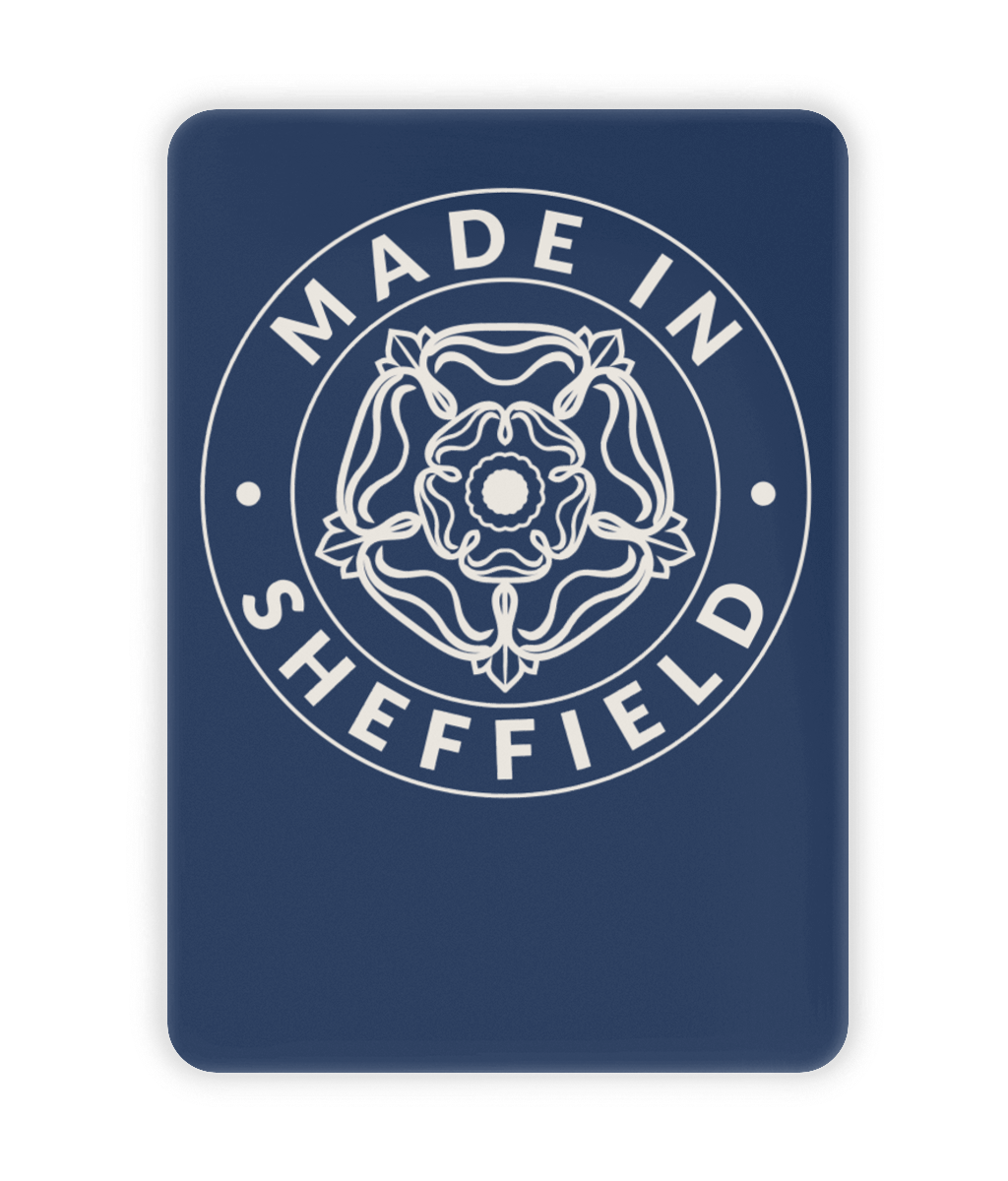 Navy blue ceramic fridge magnet with 'Made in Sheffield' text and emblem on a white background