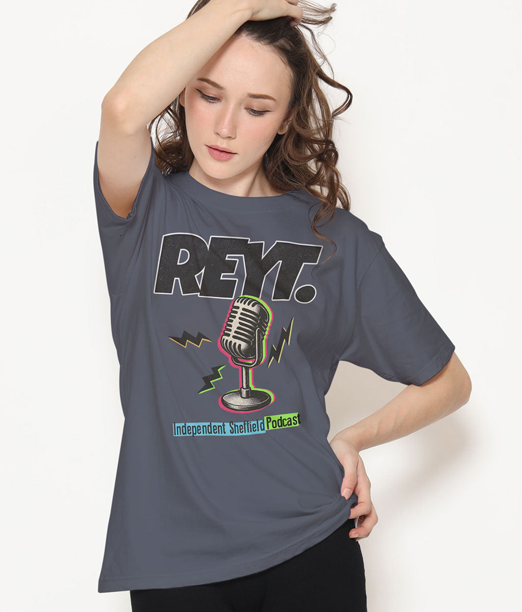 Female Model wearing a dark grey T-Shirt with a 'REYT' logo and stylised microphone design