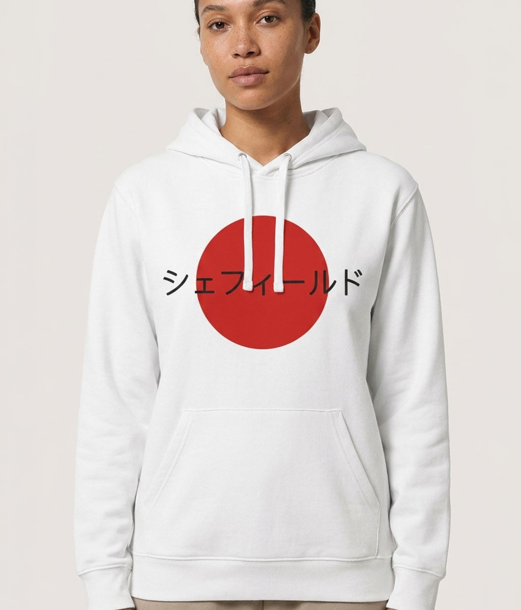 Person wearing a white hoodie with a red circle and Japanese text on a plain background