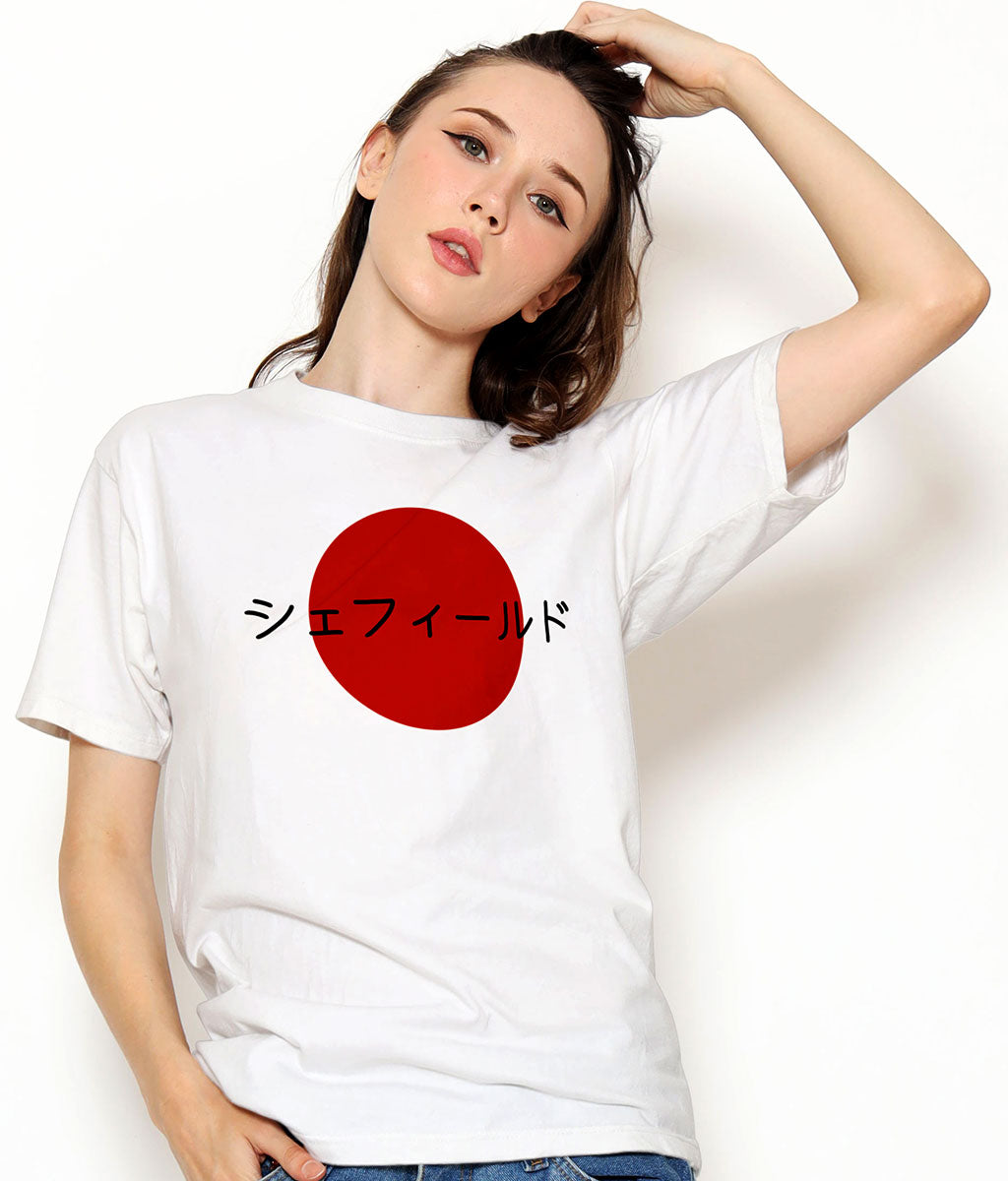Woman wearing a white t-shirt with a red circle and Japanese text on a plain background